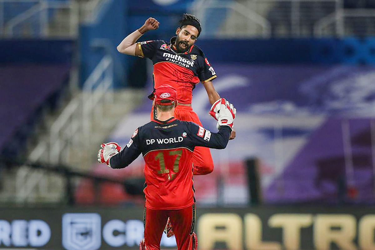 Mohammed Siraj of the Royal Challengers Bangalore celebrates the wicket of Prithvi Shaw of Delhi Capitals. Credit: PTI