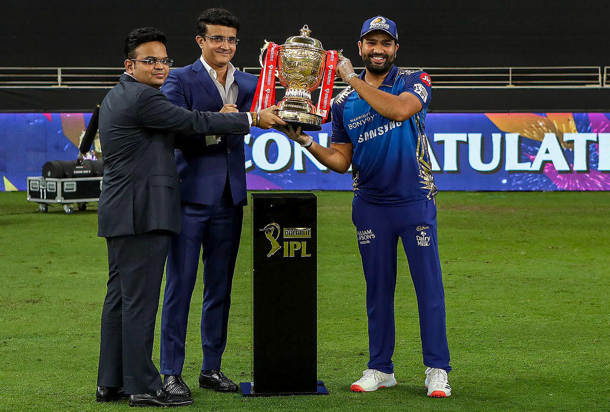 BCCI President Sourav Ganguly and BCCI Secretary Jay Shah present the winners trophy to Mumbai Indians captain Rohit Sharma. Credit: PTI Photo