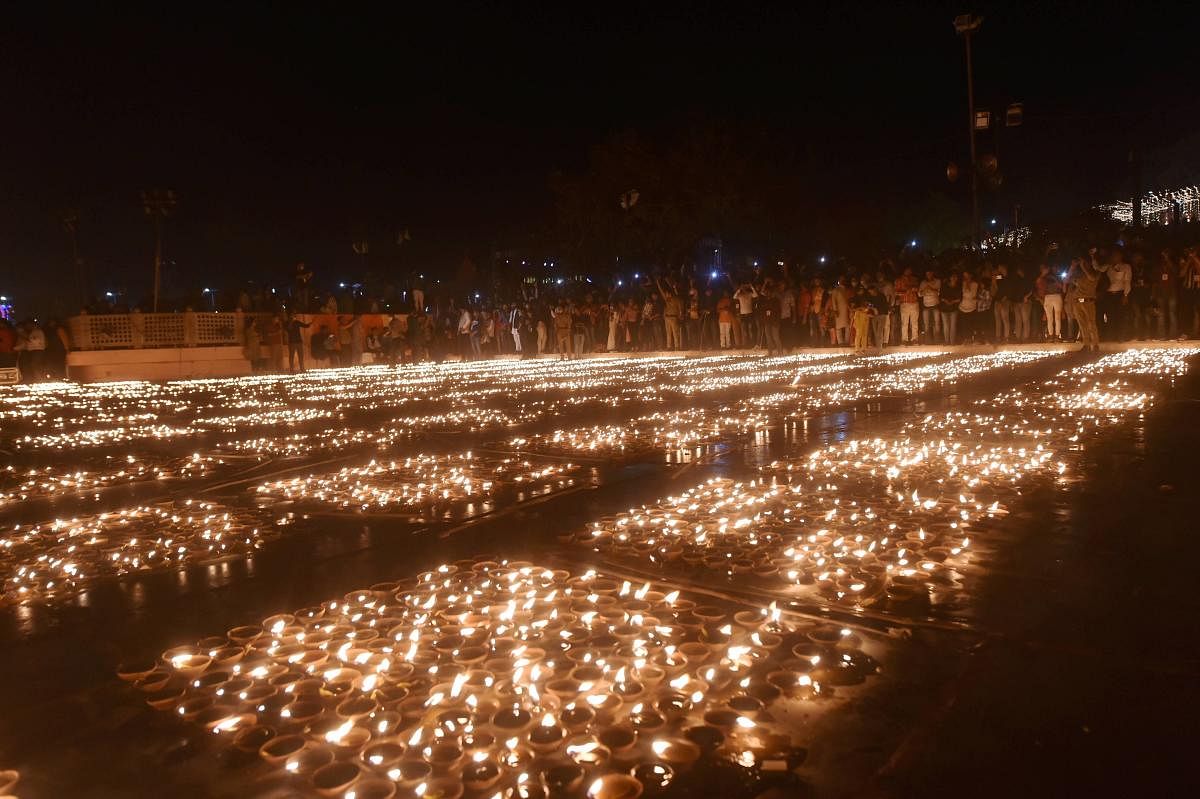 Deepotsav celebrations began in the holy city of Ayodhya in the presence of Uttar Pradesh Governor Anandiben Patel and Chief Minister Yogi Adityanath. Credit: PTI Photo
