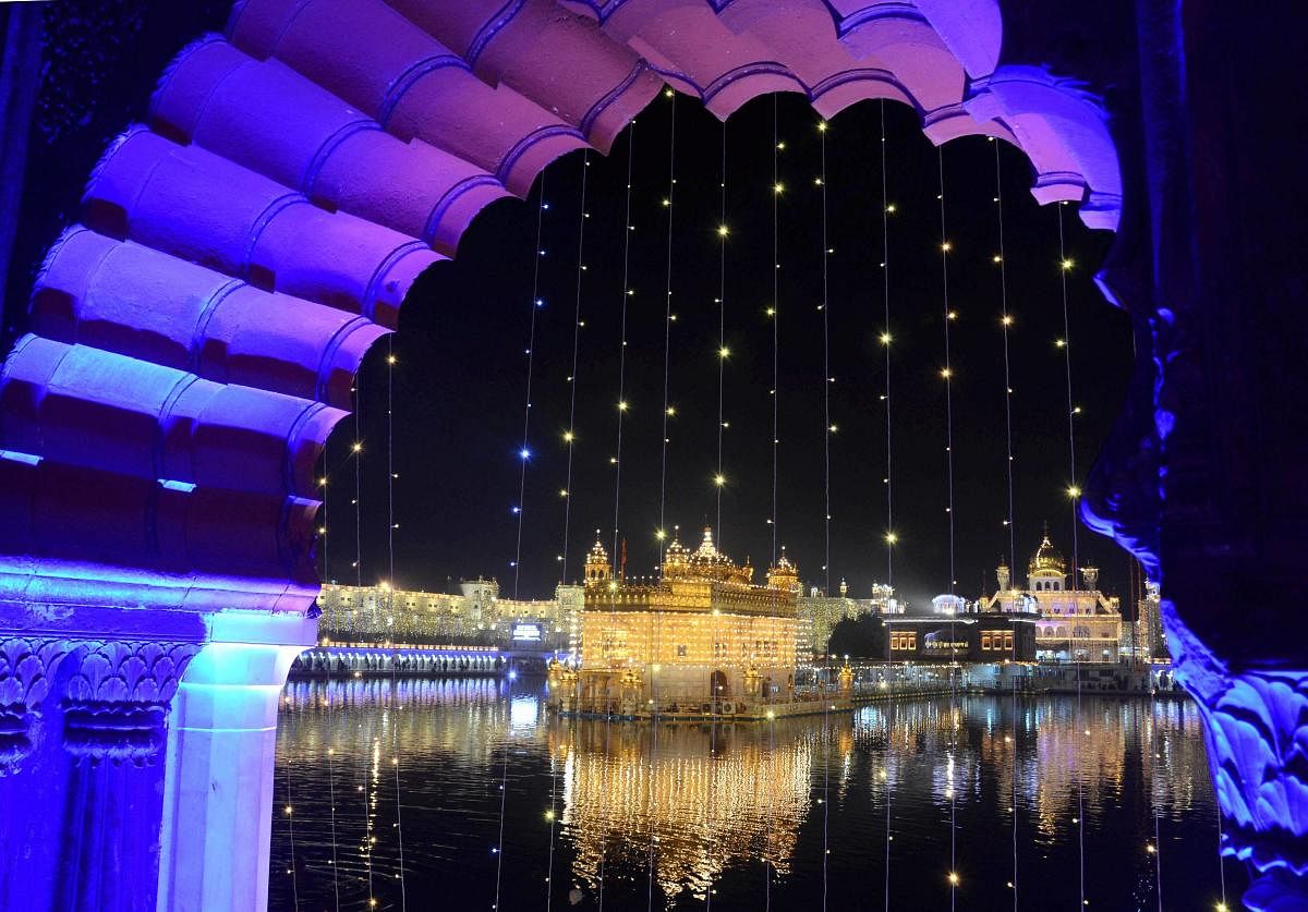 An illuminated Golden Temple on the eve of the Diwali festival, in Amritsar. Credit: PTI Photo