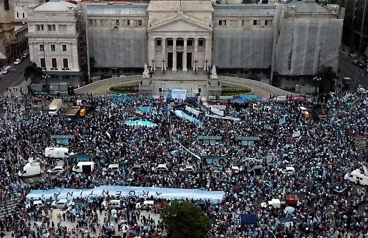 Aerial view of anti-abortion activists demonstrating against the bill to legalise abortion presented by Argentinian President Alberto Fernandez outside Argentinian Congress in Buenos Aires. Anti-abortion demonstrators, among them from the Catholic Church, the Evangelical Church and civil organizations, organized on Saturday marches and caravans in Buenos Aires and other cities of Argentina. Credit: AFP Photo.