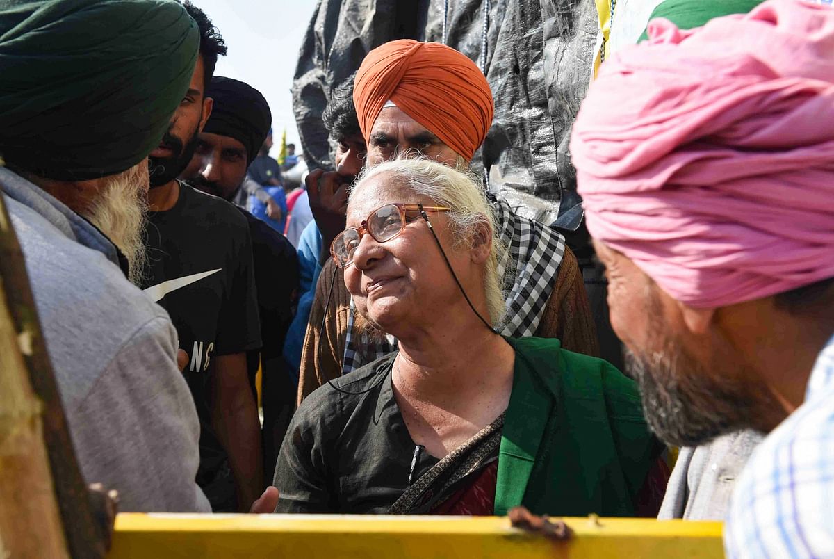 Social activist Medha Patkar interacts with farmers