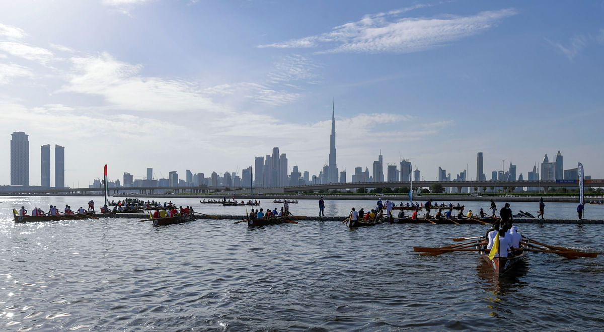 Teams compete in a contest during the Dubai traditional rowing boat race in the al-Jaddaf area of the Gulf emirate of Dubai. Credit: AFP Photo
