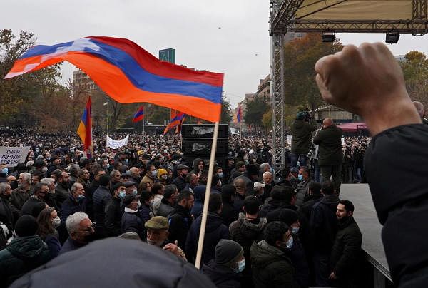 People attend an opposition rally to demand the resignation of Armenian Prime Minister Nikol Pashinyan following the signing of a deal to end a military conflict over Nagorno-Karabakh, in Yerevan, Armenia. Credit: Reuters