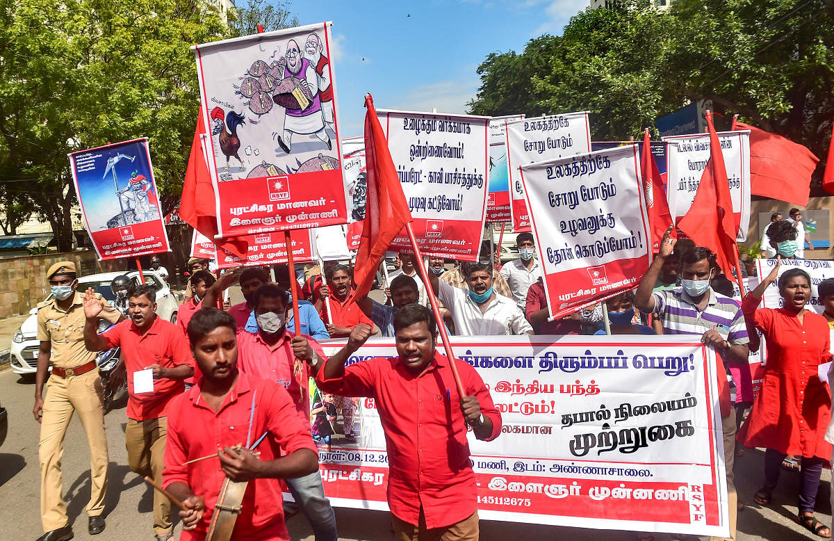 Members of All India Kisan Sangharsh Coordination Committee (AIKSCC) along with various organisations participate in a protest in support of the nationwide strike, called by farmers to press for repeal of the Centre's farm laws, in Chennai. Credit: PTI Photo.