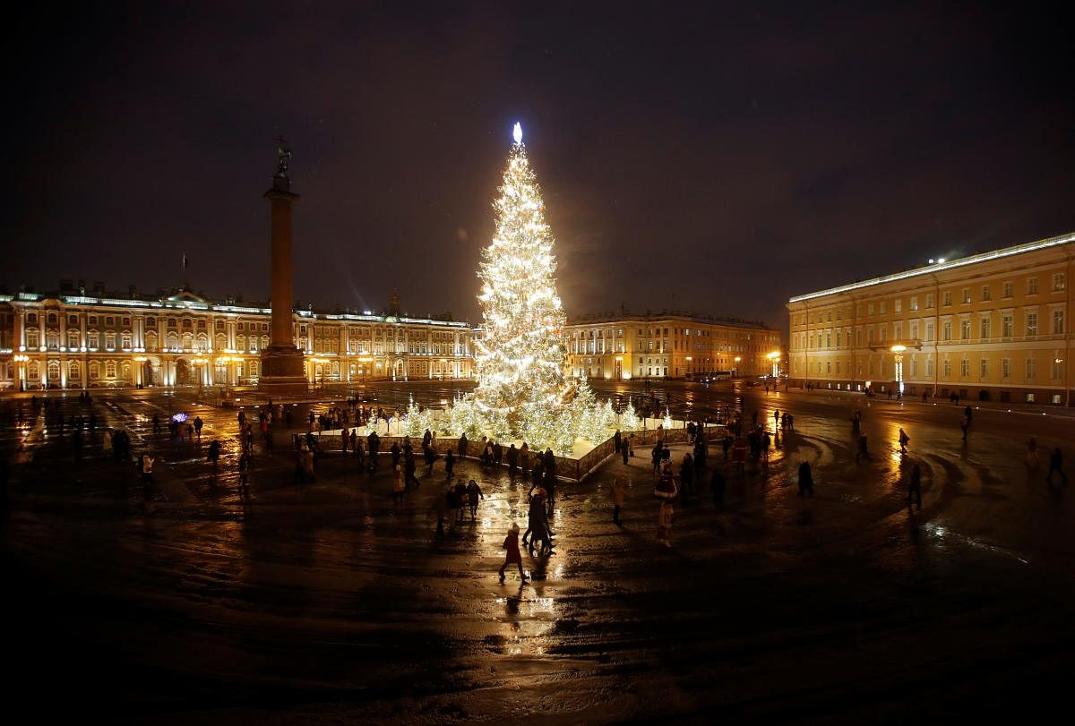 A view shows a Christmas tree installed for the upcoming holiday season in Palace Square in central Saint Petersburg, Russia. Credit: Reuters