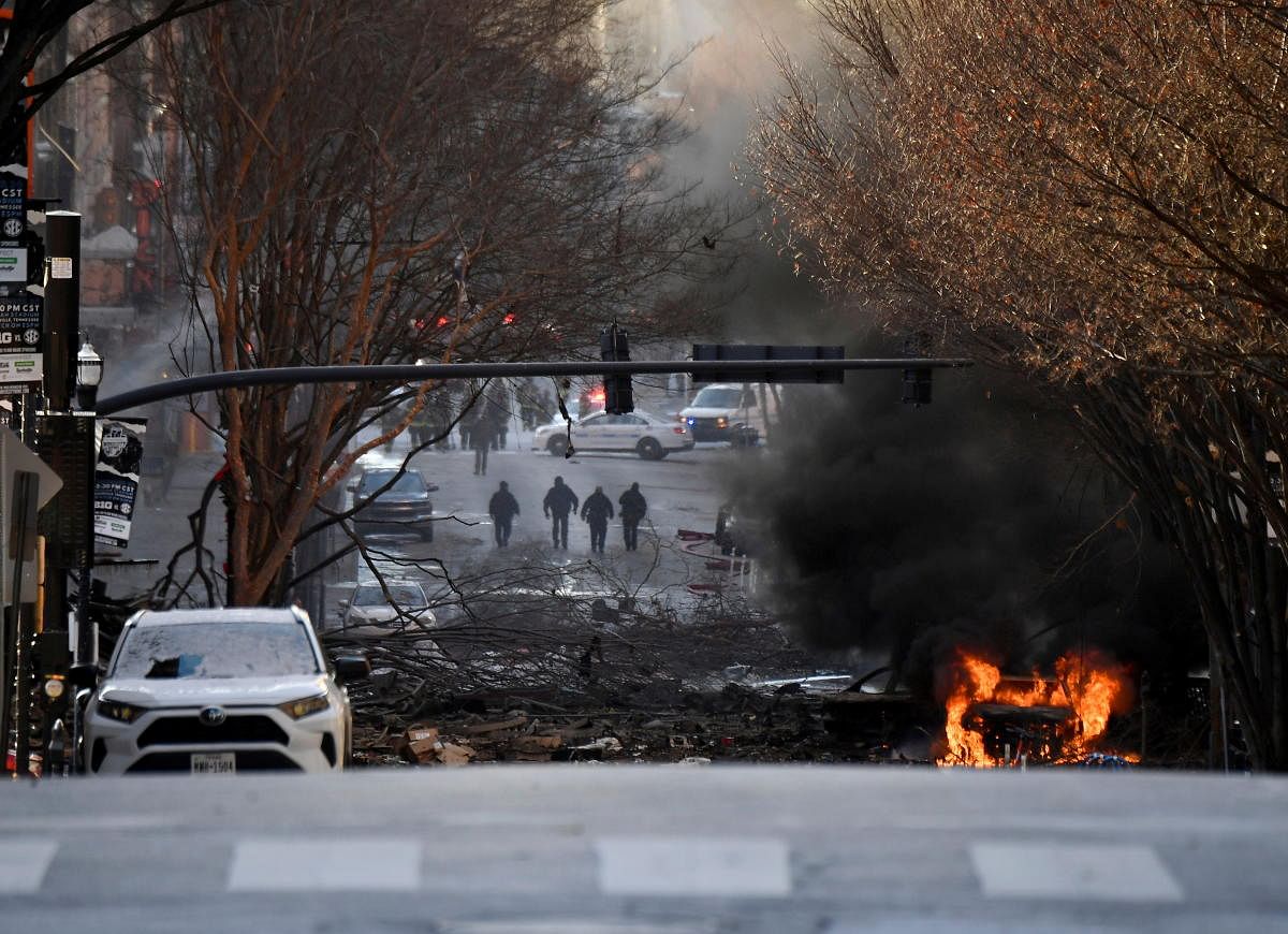 A vehicle burns near the site of an explosion in the area of Second and Commerce in Nashville, Tennessee, US. Credit: Reuters
