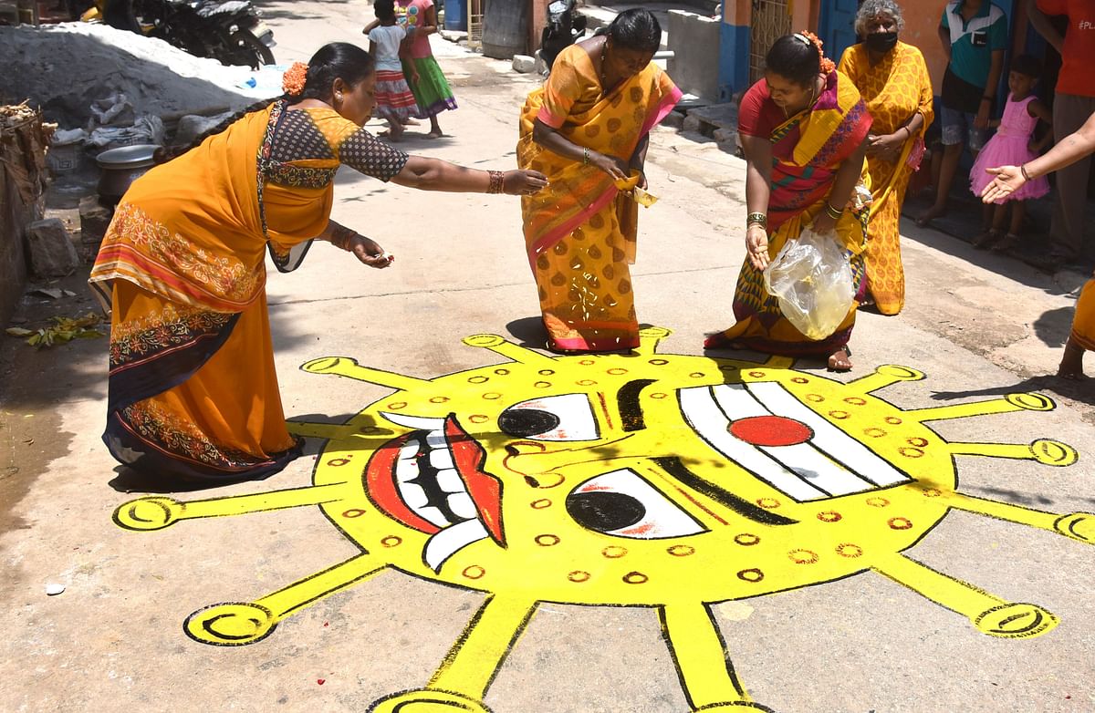 Trying times but faith lives on | Women perform Amavasya pooja to the 'Corona Maramma' (a god of diseases of sorts) to provide respite from the coronavirus amidst the lockdown. Credit: DH Photo/ SK Dinesh