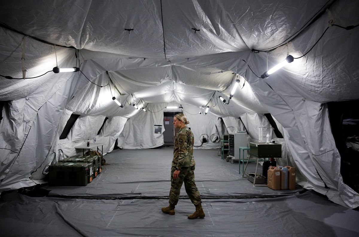 U.S. Army Captain Pam Sisler walks in the operating suite at a military field hospital for non-coronavirus patients inside CenturyLink Field Event Center during the coronavirus disease (COVID-19) outbreak in Seattle, Washington. (Credit: Reuters)