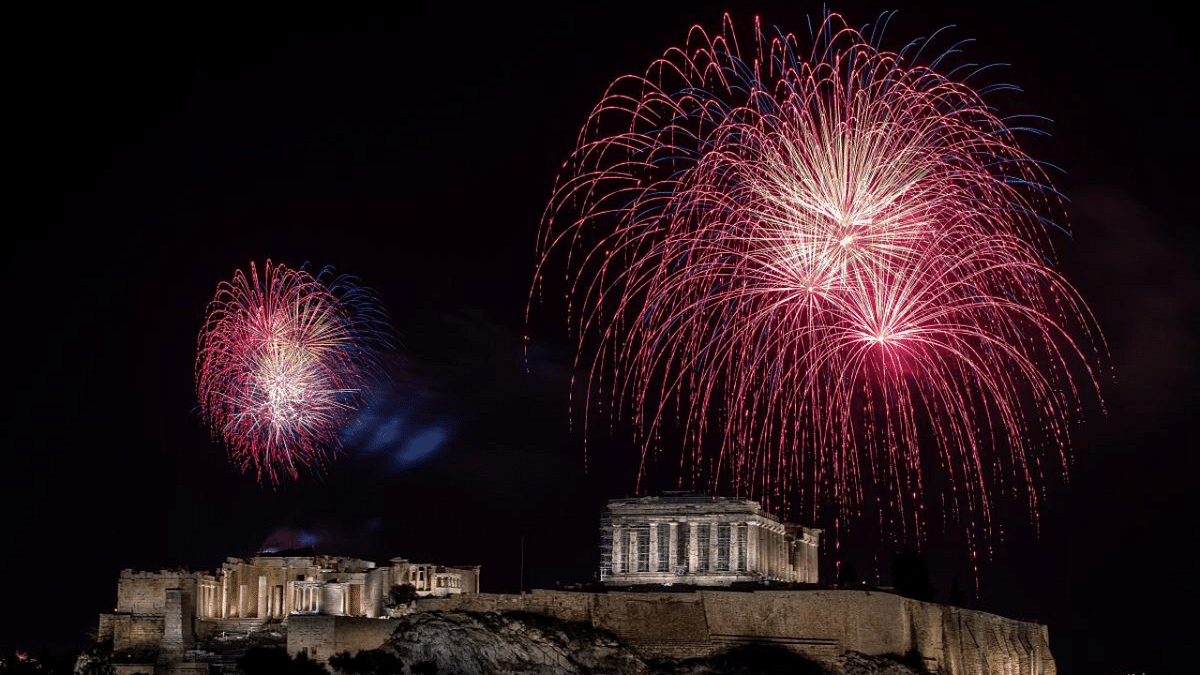 Fireworks explode over the ancient Parthenon temple atop the Acropolis hill during New Year's day celebrations, amid the Covid-19 pandemic in Athens, Greece. Credit: Reuters