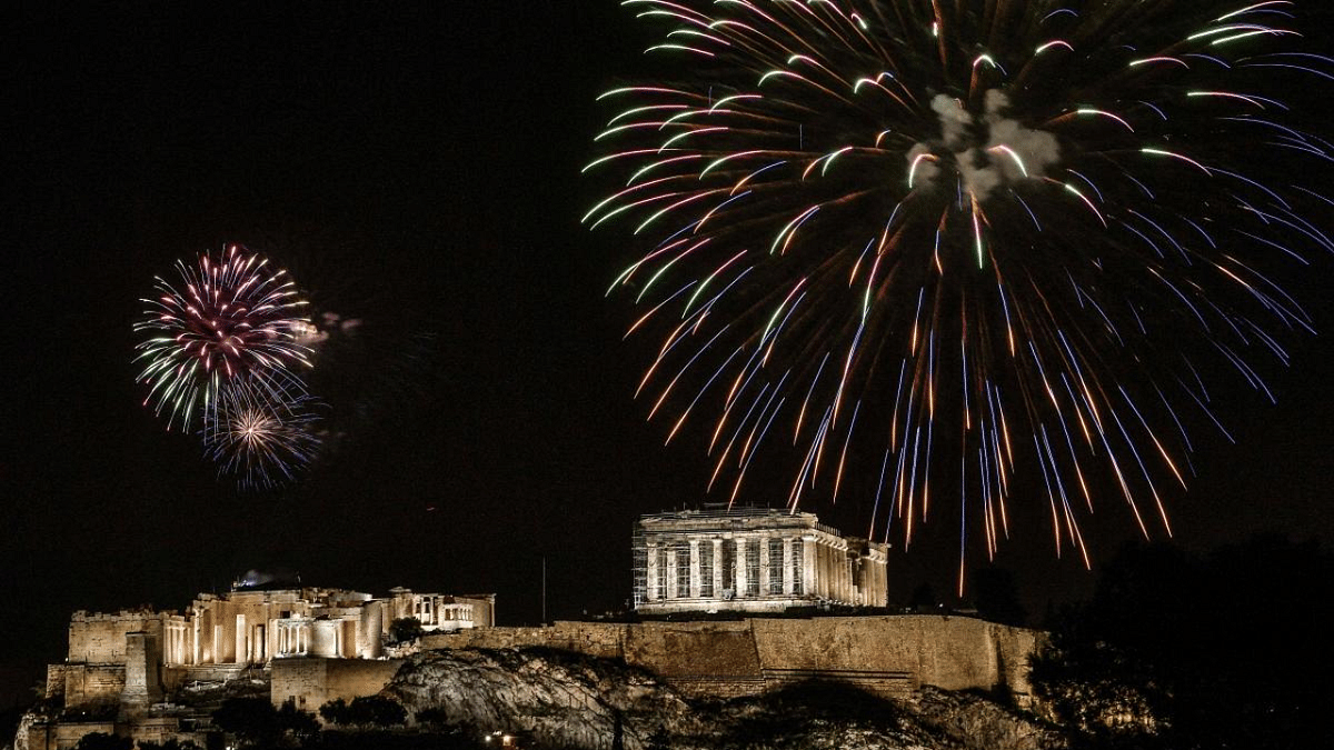 Fireworks explode over the ancient Acropolis in Athens during the New Year's celebrations on January 1, 2021 amid the Covid-19 pandemic. Credit: AFP
