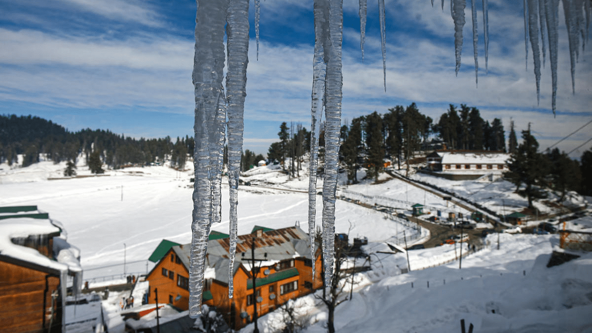 Icicles hang from the roof of a building at famous ski resort Gulmarg in North Kashmir. Credit: PTI
