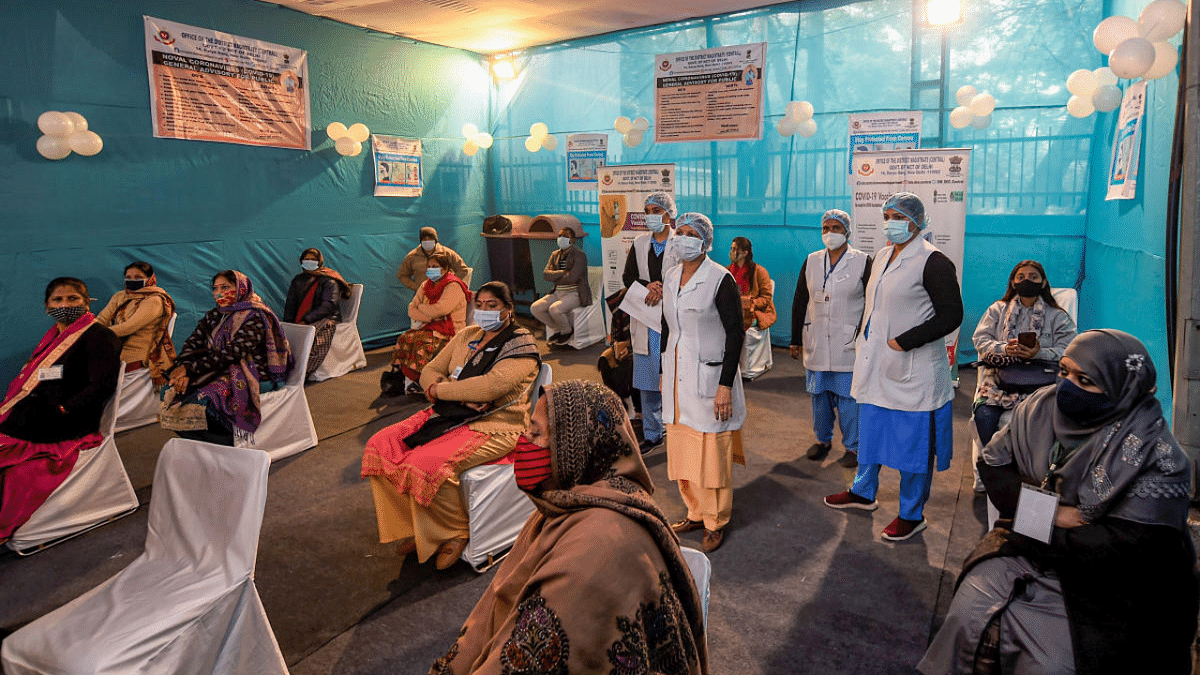 Health workers before the dry run for the Covid-19 vaccine at a healthcare center in Daryaganj, New Delhi. Credit: PTI Photo