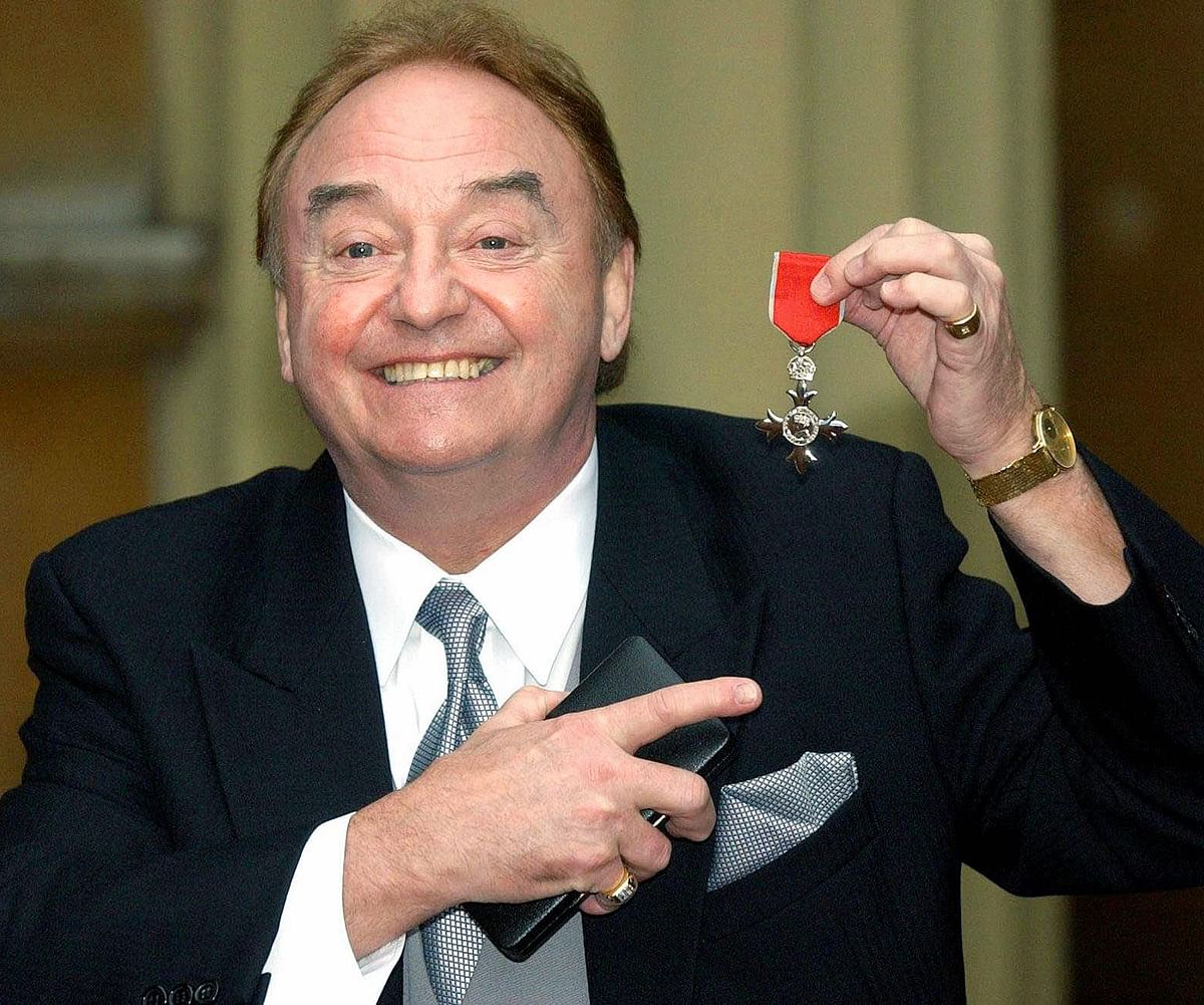 Sixties singing sensation Gerry Marsden, from Liverpool, poses with his MBE for services to Liverpudlian Charities at Buckingham Palace in London. Marsden, passed away yesterday. He is famous for popularising Liverpool Football Club's anthem,