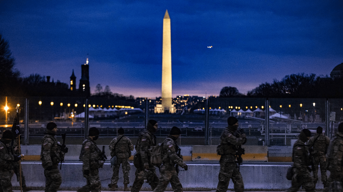 Soldiers from Bravo Company, 1st Battalion, 116th Infantry Brigade Combat Team, Virginia National Guard stand watch on the National Mall on January 17, 2021 in Washington, DC. Credit: AFP Photo