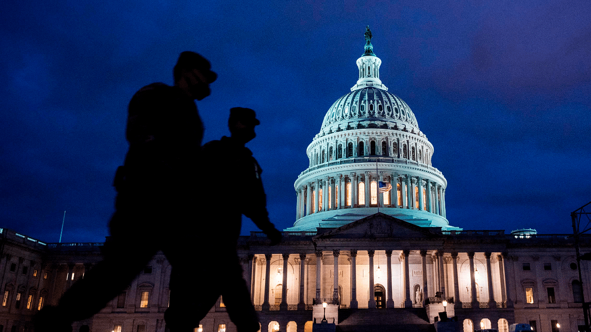 Members of the US National Guard patrol at the US Capitol in Washington, DC on January 17, 2021, during a nationwide protest called by anti-government and far-right groups supporting US President Donald Trump and his claim of electoral fraud in the November 3 presidential election. Credit: AFP Photo