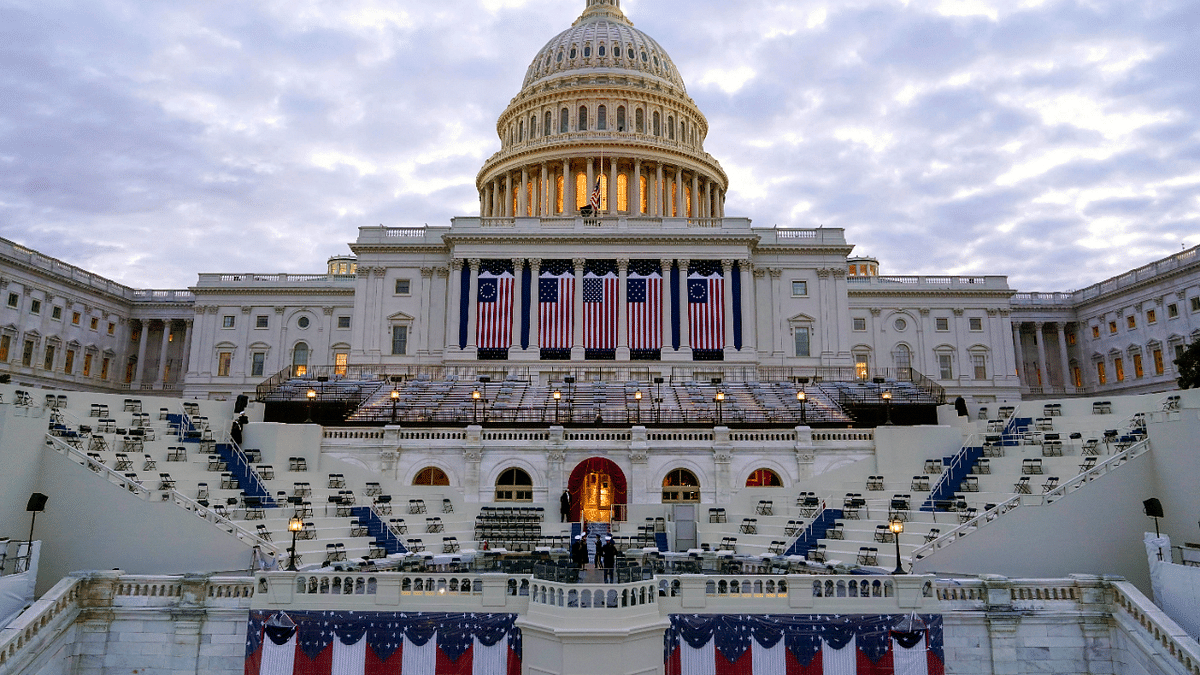 Preparations take place before a rehearsal for President-elect Joe Biden's Presidential Inauguration at the US Capitol in Washington. Credit: AP/PTI Photo