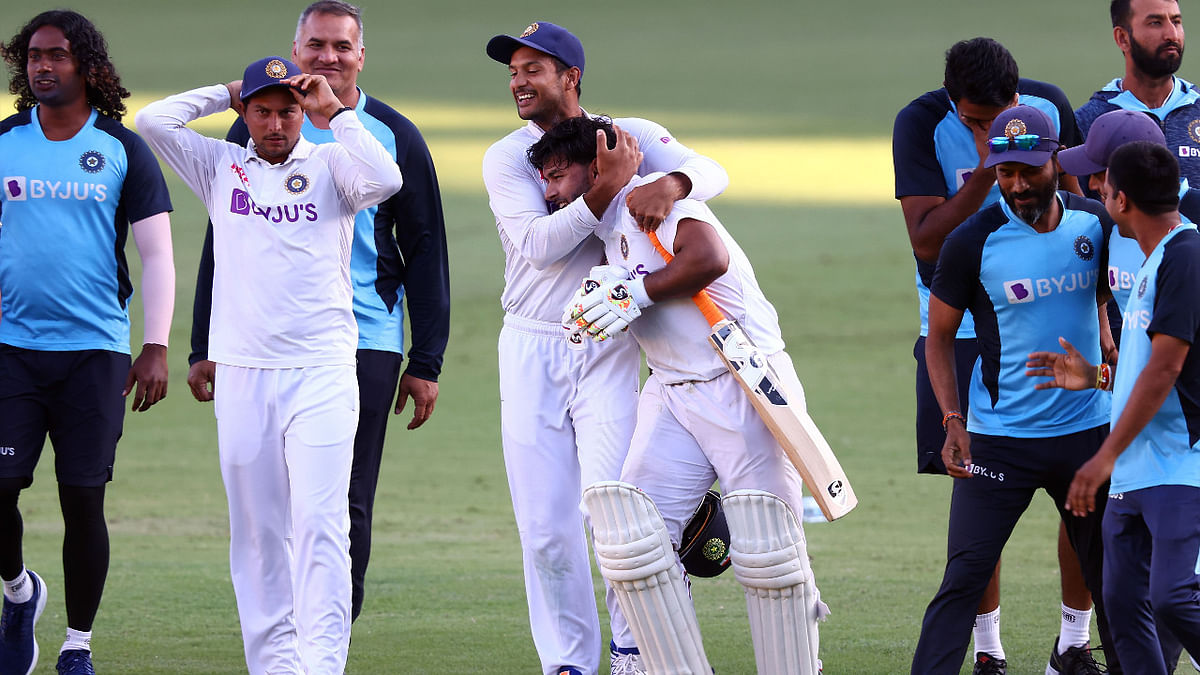 Mayank Agarwal hugs Rishabh Pant in celebration. Credit: AFP Photo