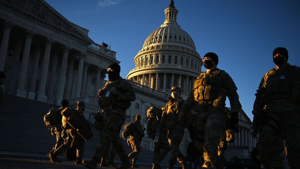 Official Washington has taken on the dystopian look of an armed camp, protected by some 25,000 National Guard troops tasked with preventing any repeat of the US Capitol violence. Credit: AFP Photo