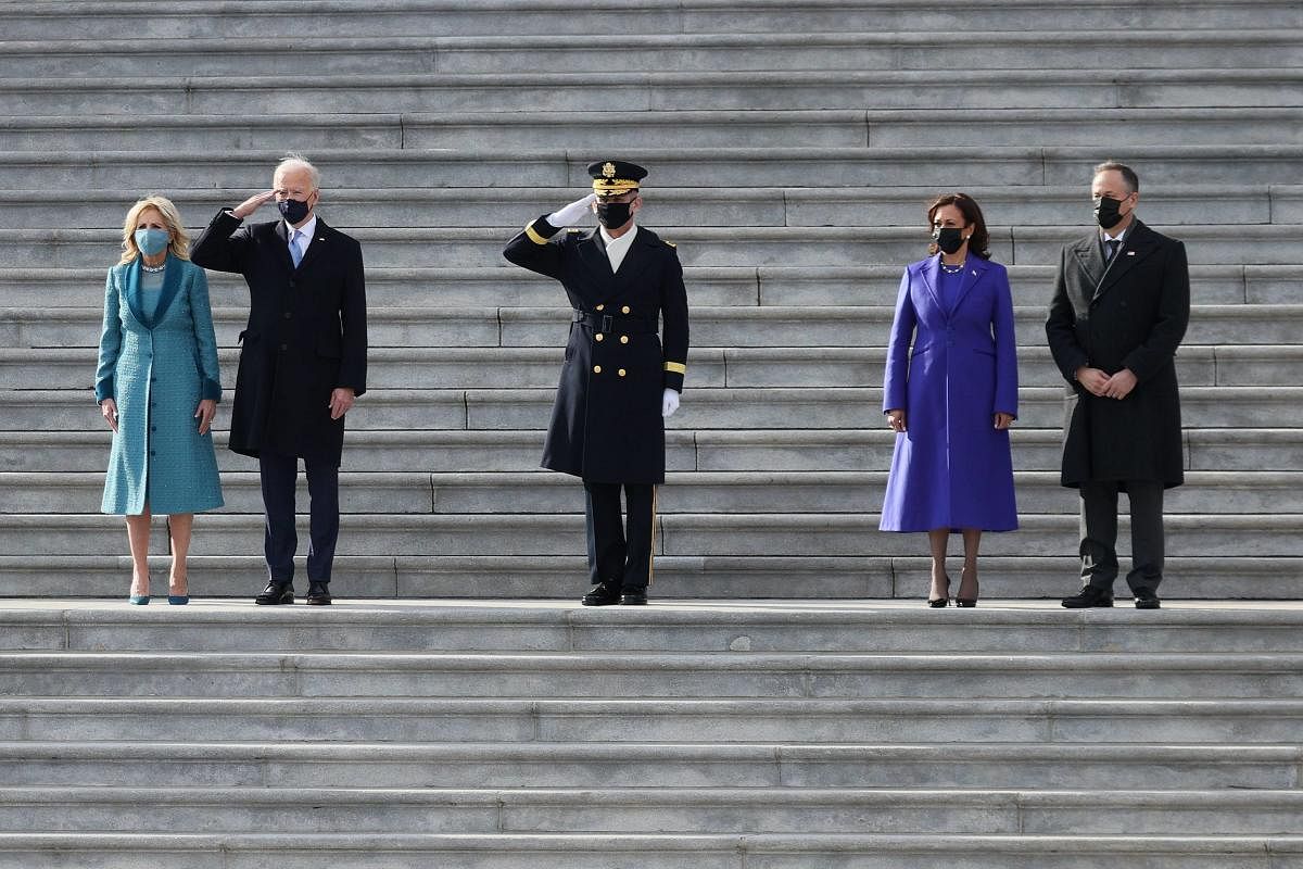 US President Joe Biden, First Lady Dr Jill Biden, US Vice President Kamala Harris and Douglas Emhoff, husband of US Vice President Harris, attend a Pass in Review ceremony, hosted by the Joint Task Force-National Capital Region on the East Front of the US Capitol after the 59th Presidential Inauguration on January 20, 2021 in Washington, DC. Credit: AFP Photo