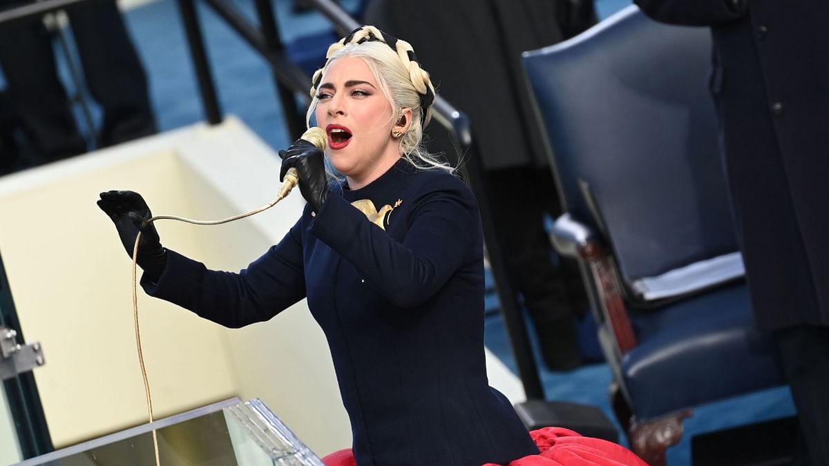 US Singer Lady Gaga sings the US National Anthem at the beginning of the swearing in ceremony of the 46th US President at the US Capitol in Washington, DC. Credit: AFP Photo