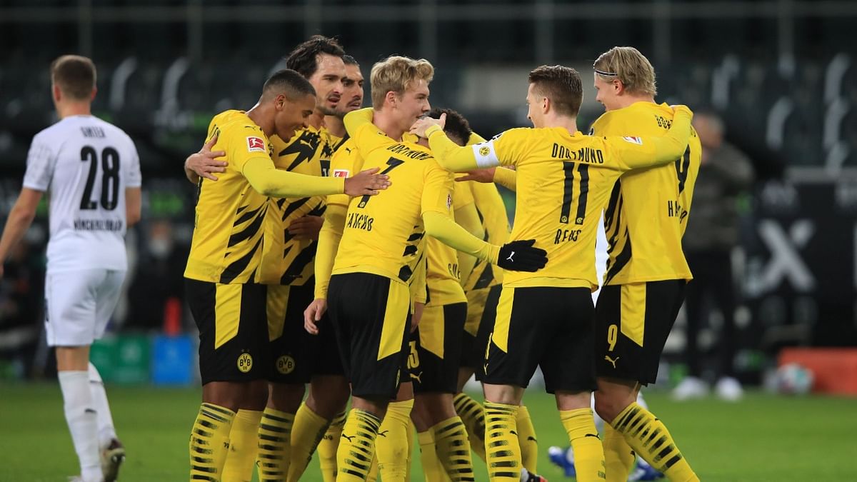 1 | Borussia Dortmund | YoY change in operating revenue for 2019-20 season: +0.6% | Credit: AFP Photo