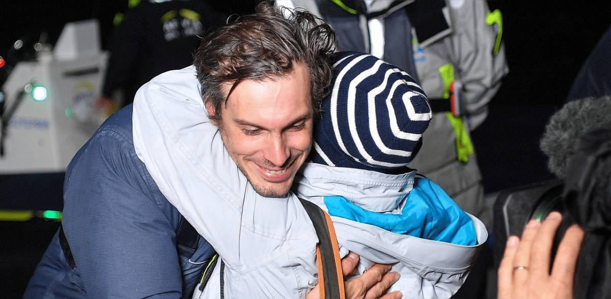 French skipper Charlie Dalin, 36, who sailed his Imoca 60 monohull 'Apivia' in the 2020/2021 ninth edition of the Vendee Globe round-the-world solo race, celebrates with his mother after crossing the finish line at Les Sables d'Olonne, western France. Credit: AFP photo.
