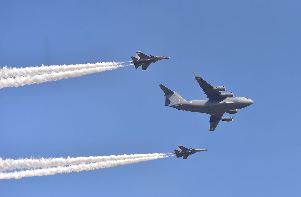Indian Air Force's C-17 Globemaster and two Su-30 jets flypast in a formation during rehearsals for the Aero India 2021, at the Yelahanka air base in Bengaluru. Credit: PTI Photo