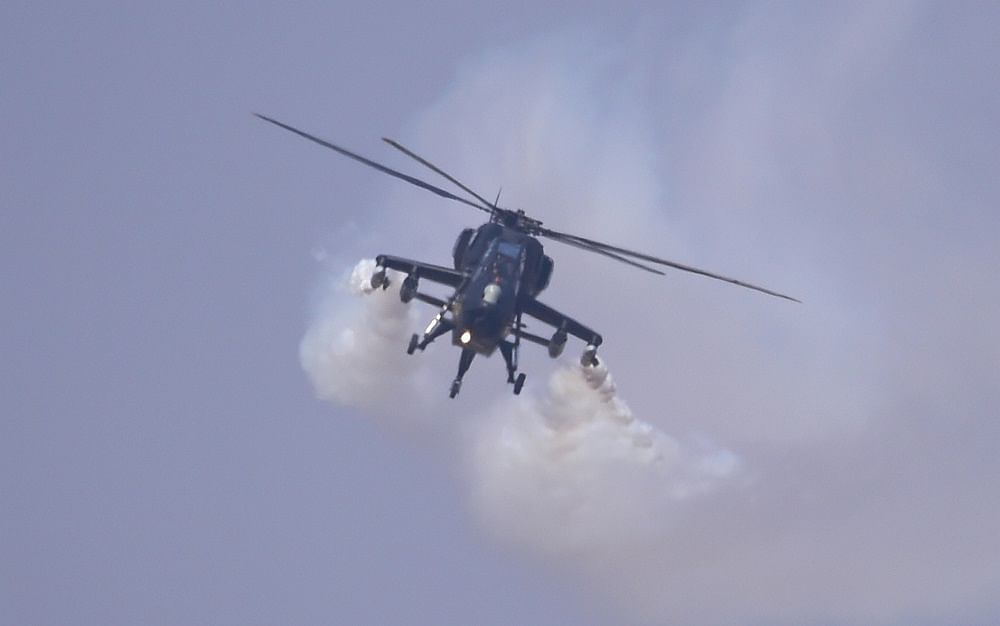 ndian Air Force's light combat helicopter 'Rudra' performs during rehearsals for the Aero India 2021. Credit: PTI Photo