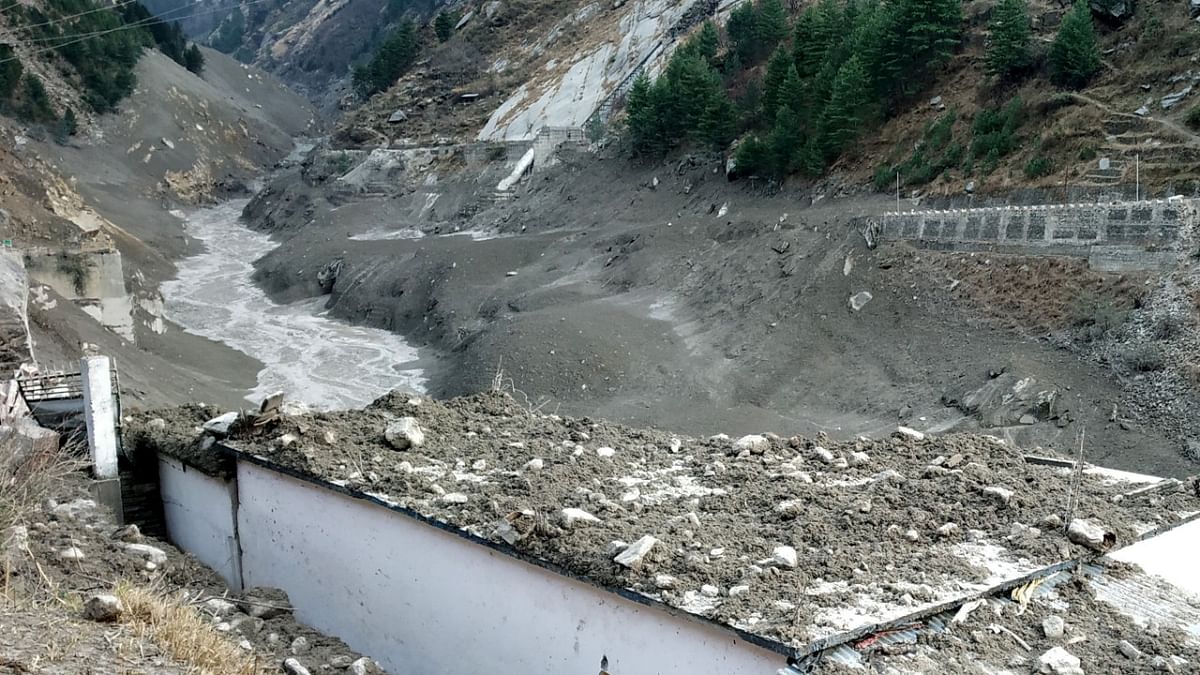 A view of the damage caused after a Himalayan glacier broke and crashed into a dam at Raini Chak Lata village in Chamoli district, northern state of Uttarakhand. Credit: Reuters File Photo.