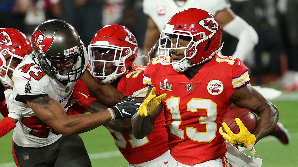 Byron Pringle #13 of the Kansas City Chiefs runs with the ball in the first quarter against the Tampa Bay Buccaneers in Super Bowl LV at Raymond James Stadium. Credit: AFP Photo.