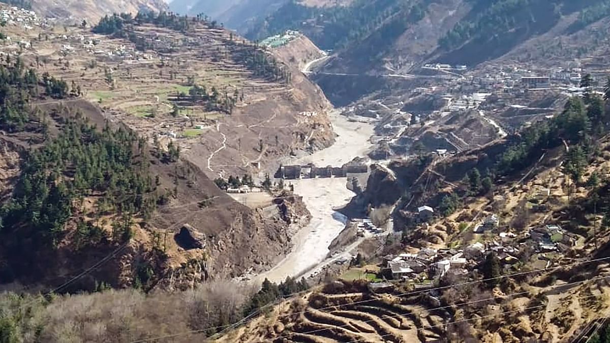 A view of the damaged dam of the Rishi Ganga Power Project, after a glacier broke off in Joshimath in Uttarakhand’s Chamoli district causing a massive flood in the Dhauli Ganga river. Credit: PTI File Photo.