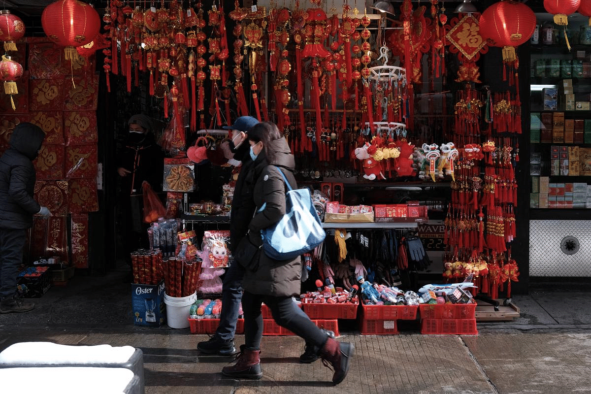 Lunar New Year decorations are displayed in Chinatown on the eve of the holiday in New York City. Lunar New Year, also known as the Chinese New Year or Spring Festival, begins on Friday and will conclude the Year of the Rat and begin the Year of the Ox. Credit: AFP Photo