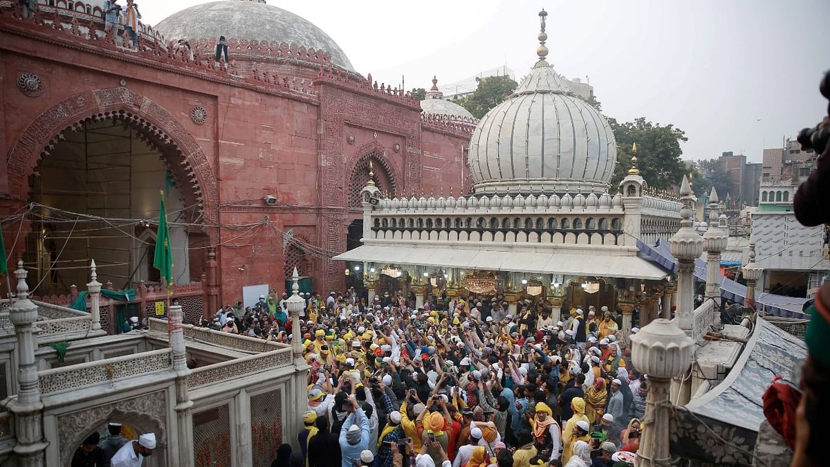 Devotees celebrate 'Basant Panchami' festival at Hazrat Nizamuddin Aulia Dargah in New Delhi. Credit: PTI Photo