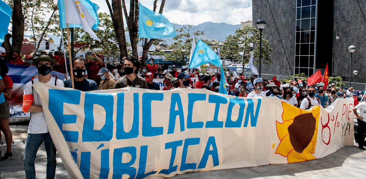 Students and professors from Costa Rican universities demonstarte against the possible approval of an International Monetary Fund (IMF) loan, in front of the Congress in San Jose. Credit: AFP Photo