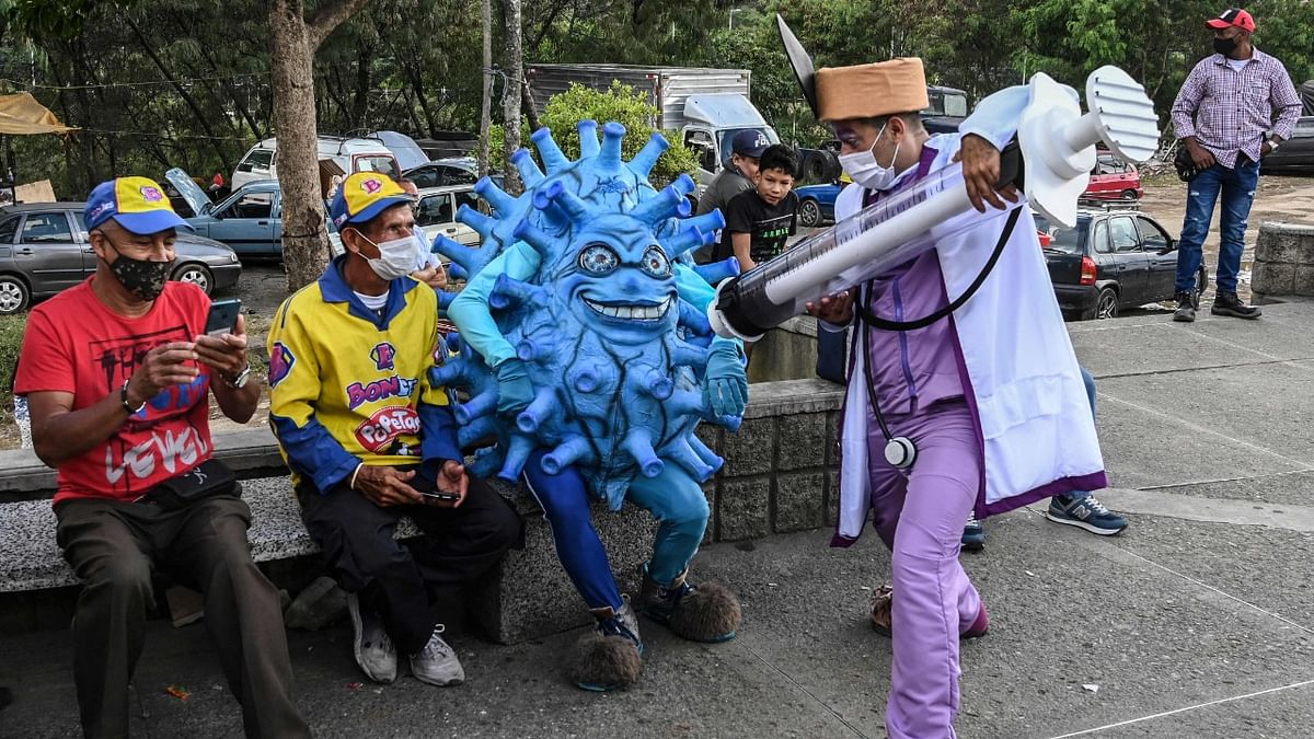 Artists perform during a campaign to promote vaccination against Covid-19 amid the coronavirus pandemic, in Medellin, Colombia. Credit: AFP Photo