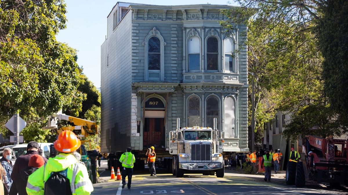 The 139-year-old Victorian house known as the Englander House is hoisted on a flat bed truck and pulled down Fulton Street towards its new location, as the original site is to be used to build a 48-unit, eight-story apartment building. Credit: Reuters Photo