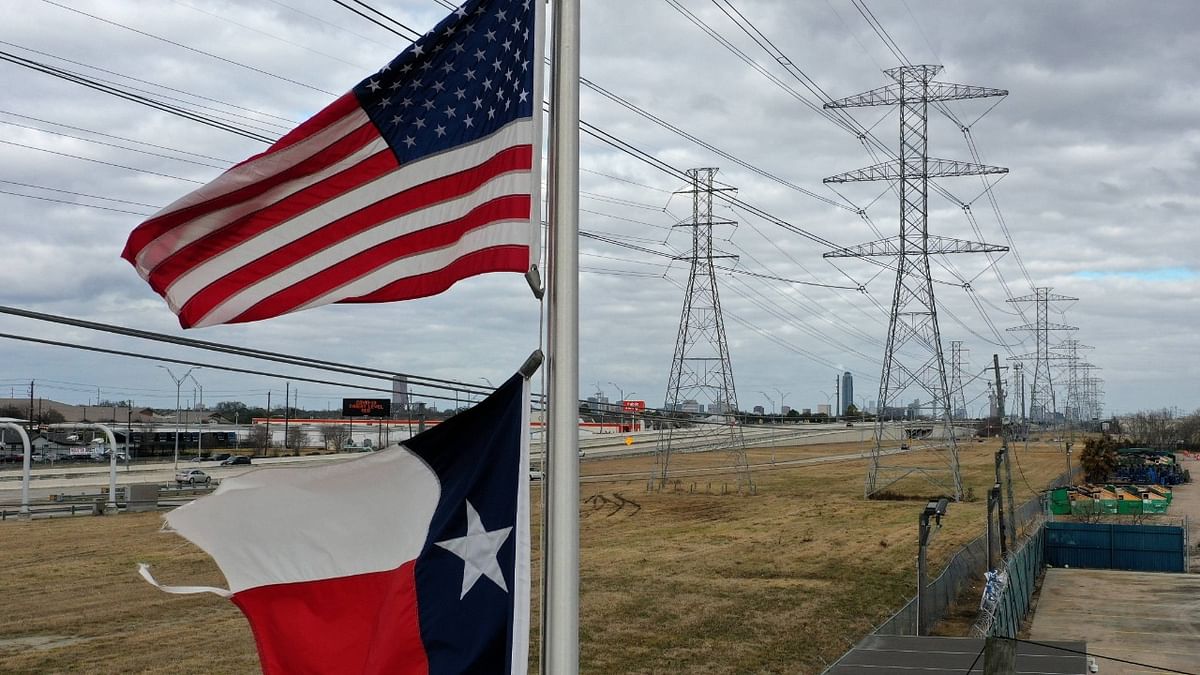 Millions of Texans lost power when winter storm Uri hit the state and knocked out coal, natural gas and nuclear plants that were unprepared for the freezing temperatures brought on by the storm. Wind turbines that provide an estimated 24 percent of energy to the state became inoperable when they froze. Credit: AFP Photo