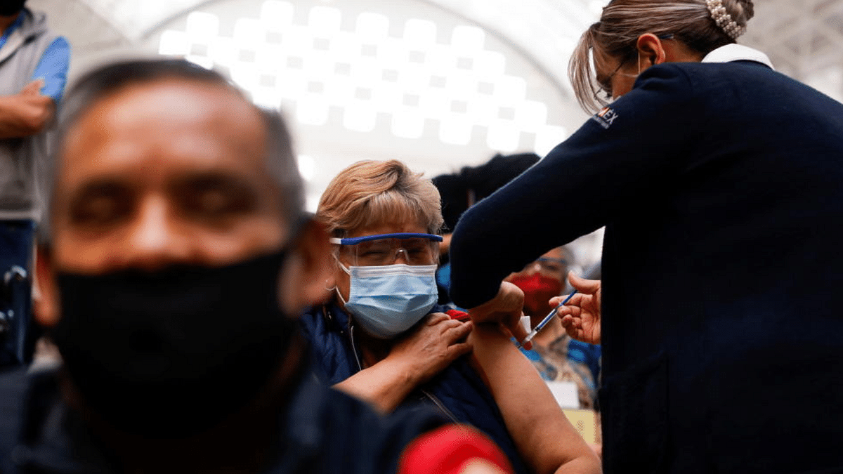 People are administered the Sinovac coronavirus disease (COVID-19) vaccine during a mass vaccination in Ecatepec, Mexico. Credit; Reuters Photo