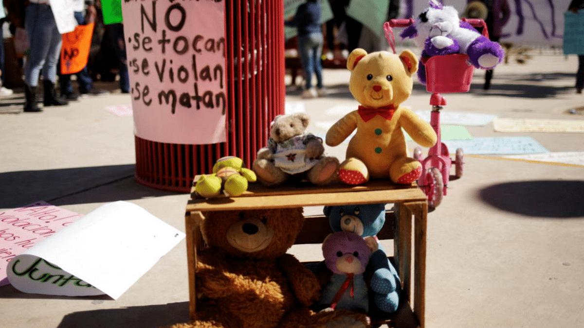 Children's toys are seen during a protest to demand justice against a Catholic priest accused of sexually abusing a minor, outside the courts in Ciudad Juarez, Mexico. Credit: Reuters Photo