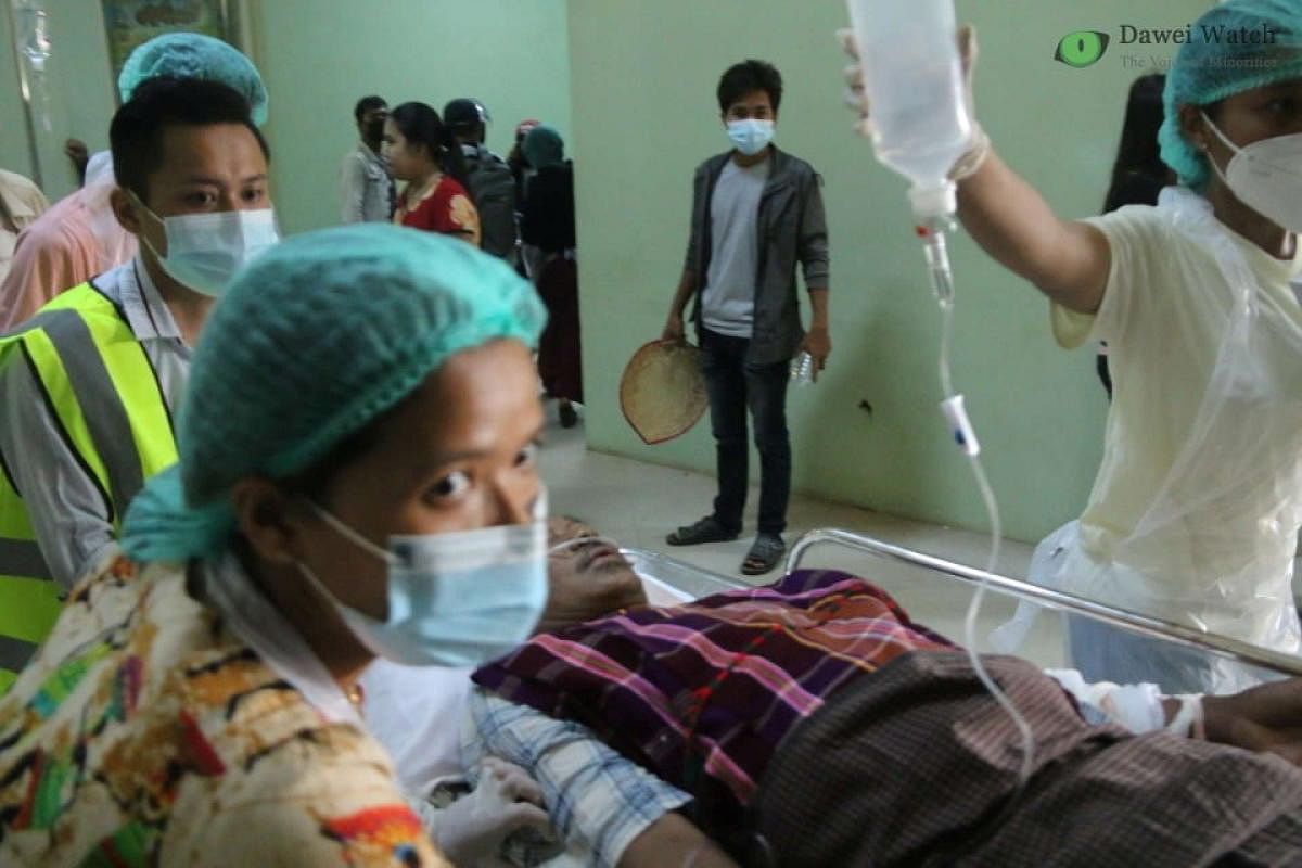 A wounded protester receives treatment from a medical staff amid protests against the military coup in Dawei, Myanmar February 28, 2021 in this picture obtained from social media. Credit: Reuters