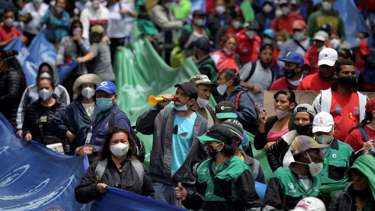 Recyclers take part in a protest in demand of government protection during the Waste Picker Day in Bogota. Credit: AFP Photo