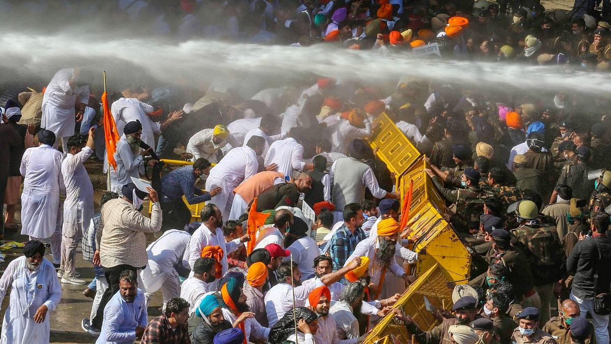 Police uses water cannons to disperse and stop Shiromani Akali Dal (SAD) workers and leaders from marching towards the Punjab Vidhan Sabha during a rally, in Chandigarh. Credit: PTI Photo
