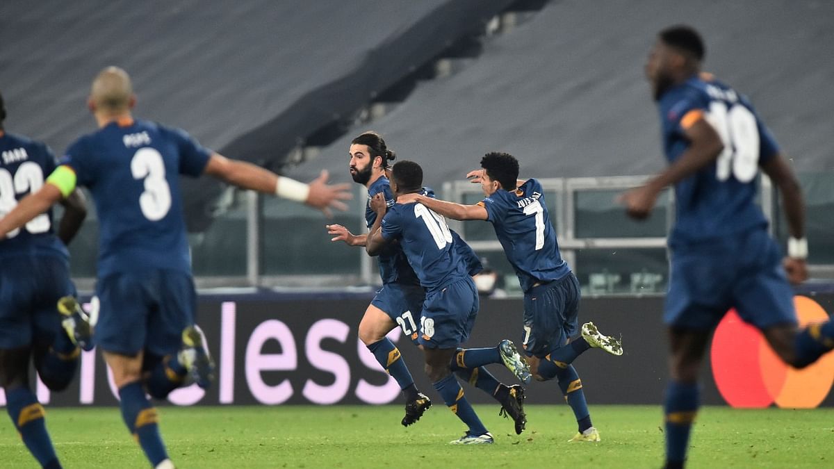 FC Porto's Sergio Oliveira celebrates scoring their second goal which sent them to the quarterfinals of the UEFA Champions League on away goals during their 3-2 second leg loss against Juventus at Turin. Credit: Reuters Photo.