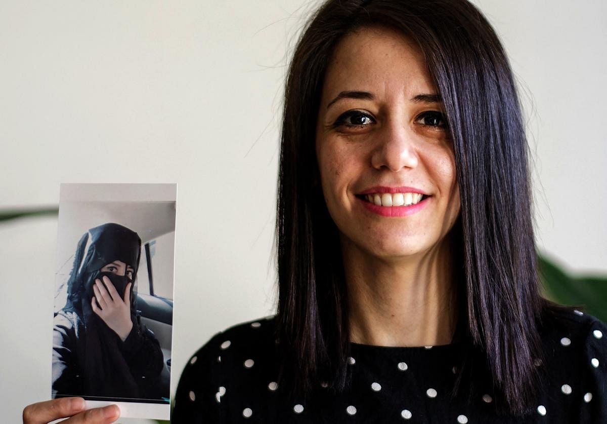 Rukaia Alabadi, 32, arrived in Paris as a refugee in 2018 after escaping threats over her reporting about the reality of life in the eastern province of Deir Ezzor under the Islamic State jihadist group.  Before that, the young woman had been jailed for months by the regime and accused of being a media activist.  The picture she shared with AFP shows her wearing a chador and a face veil in 2011 when she was studying economics at university.
