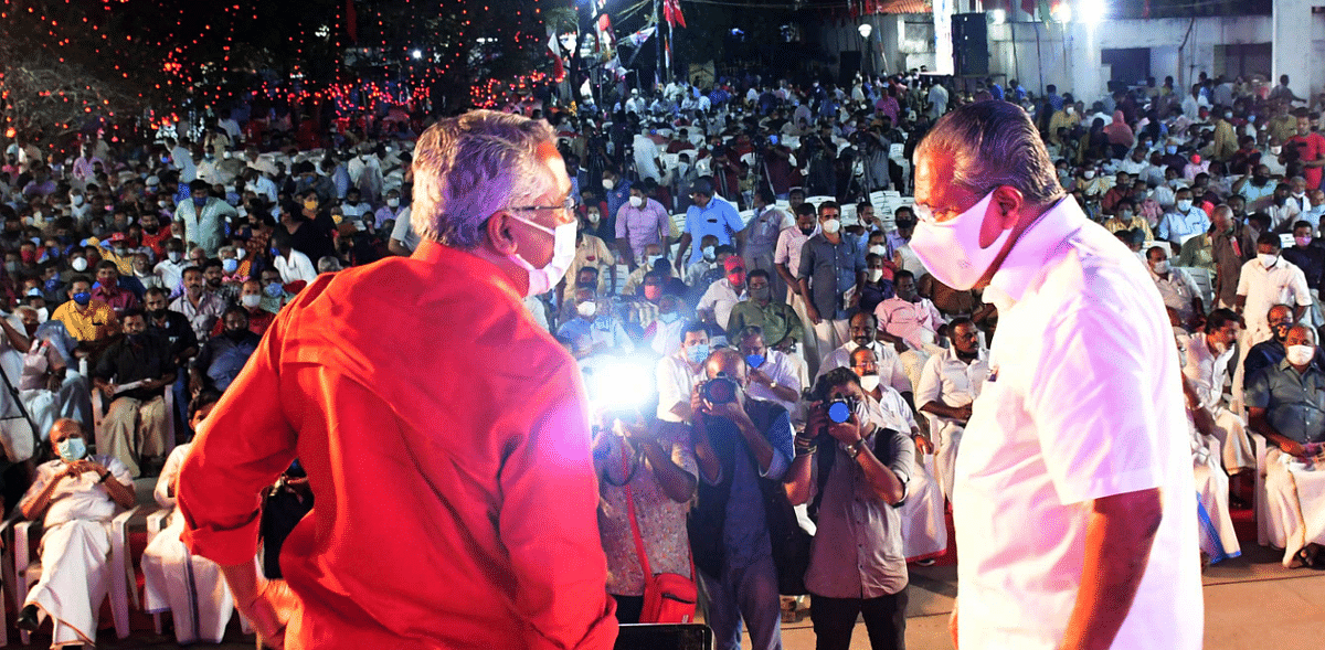 Kerala Chief Minister Pinarayi Vijayan and CPI leader Binoy Viswam (left) during the conclusion of the southern leg of the LDF's Vikasana Munnetta Jataha in Thiruvananthapuram. Credit: PTI Photo