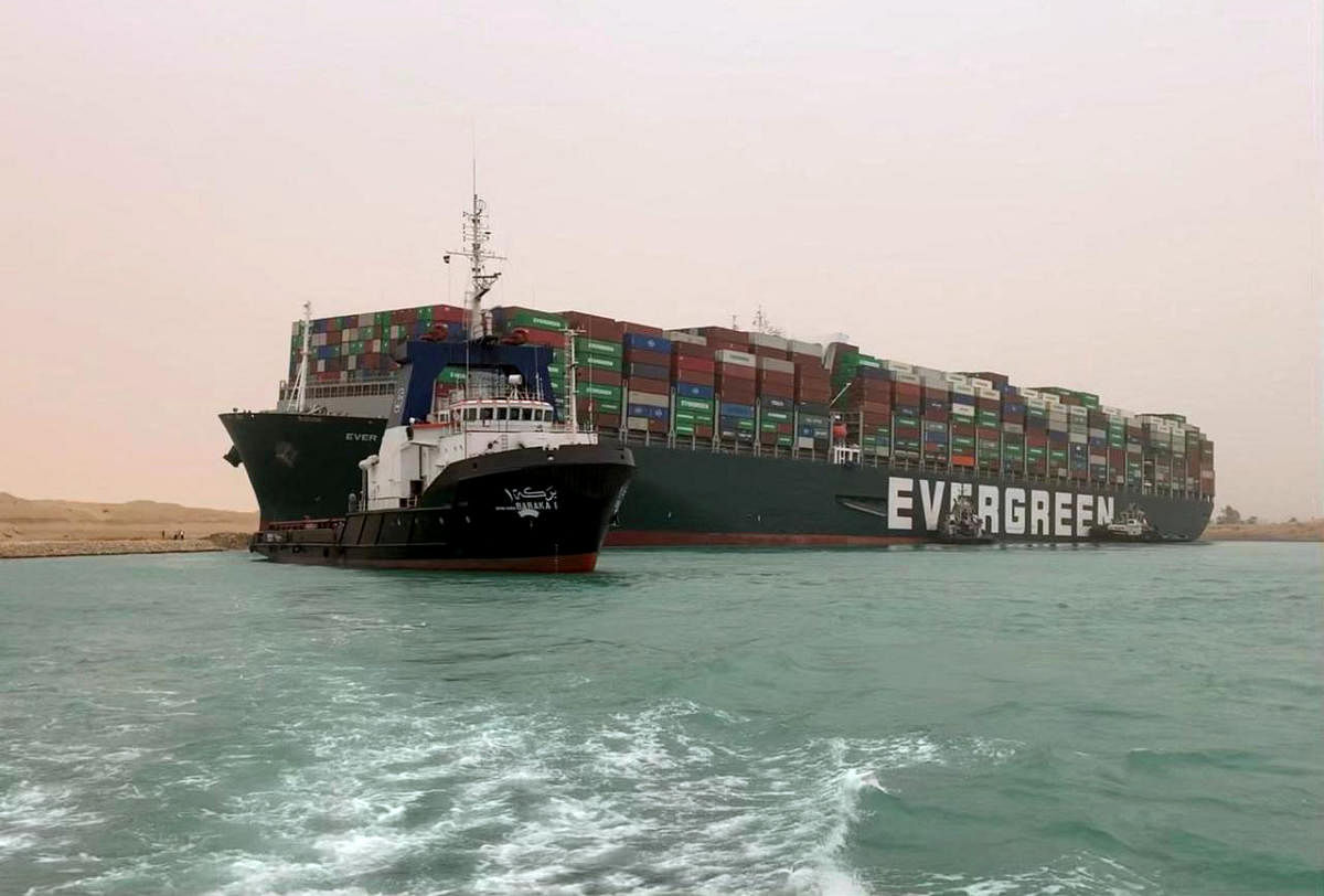 Taiwan-owned MV Evergreen, a 400-metre-long and 59-metre-wide vessel, is lodged sideways and impeding all traffic across Egypt's Suez Canal.  Credit: AFP Photo