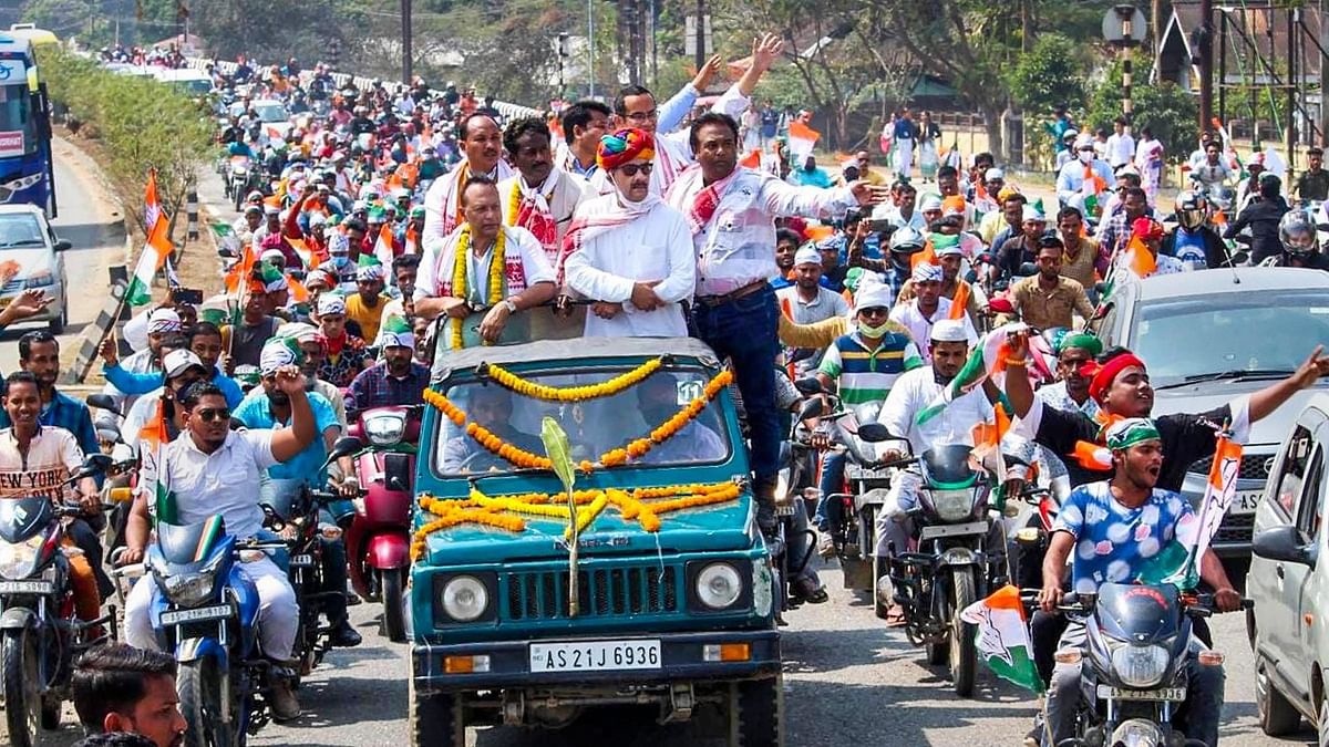 AICC General Secretary and in-charge of Assam, Jitendra Singh with party MP Gaurav Gogoi and senior leader Pradyut Bordoloi during an election rally, ahead of State Assembly elections, in Nagoan district, Thursday, March 11, 2021. Credit: PTI File Photo