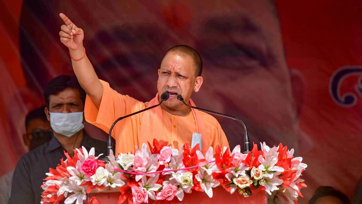 Uttar Pradesh Chief Minister Yogi Adityanath held Congress responsible for lack of development and illegal influx in the North East and rise of militancy in Kashmir in its quest for power. Addressing a poll campaign rally in Hojai district, Wednesday, March 17, 2021, the senior BJP leader charged the Congress, the main opposition party in Assam, of ignoring the people's welfare and development of the region in its quest for power. Credit: PTI File Photo