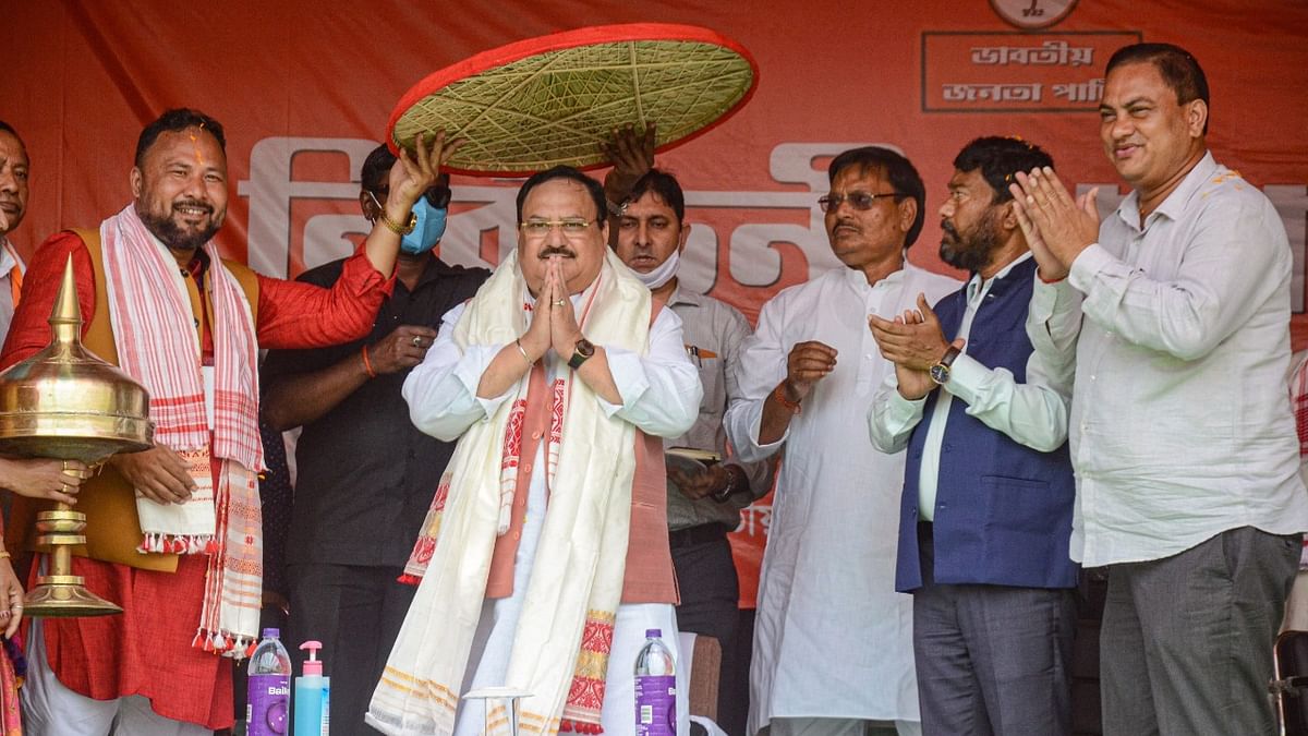 BJP National President J P Nadda being felicitated with a 'japi' at an election campaign rally, ahead of Assam Assembly polls, at Tingkhong in Dibrugarh district, Monday, March 22, 2021. Credit: PTI File Photo